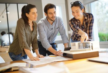 Architects looking over project for modern house design